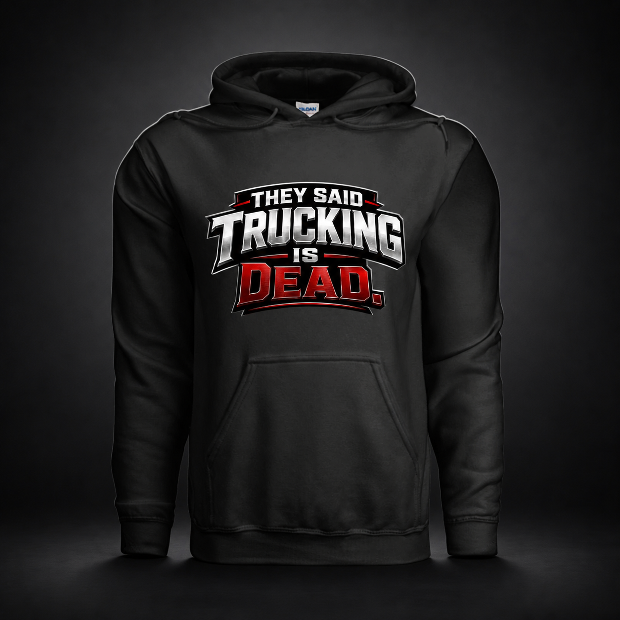 They Said Trucking Is Dead black trucker hoodie on charcoal studio background